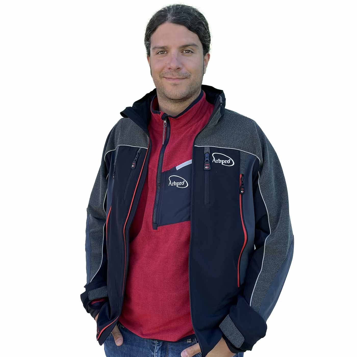 Micro Fleece red microfleece top with half-length zipper and black chest pocket with white zipper and Arbpro logo, worn by a man under a black and gray jacket with multiple zippered pockets and Arbpro logo