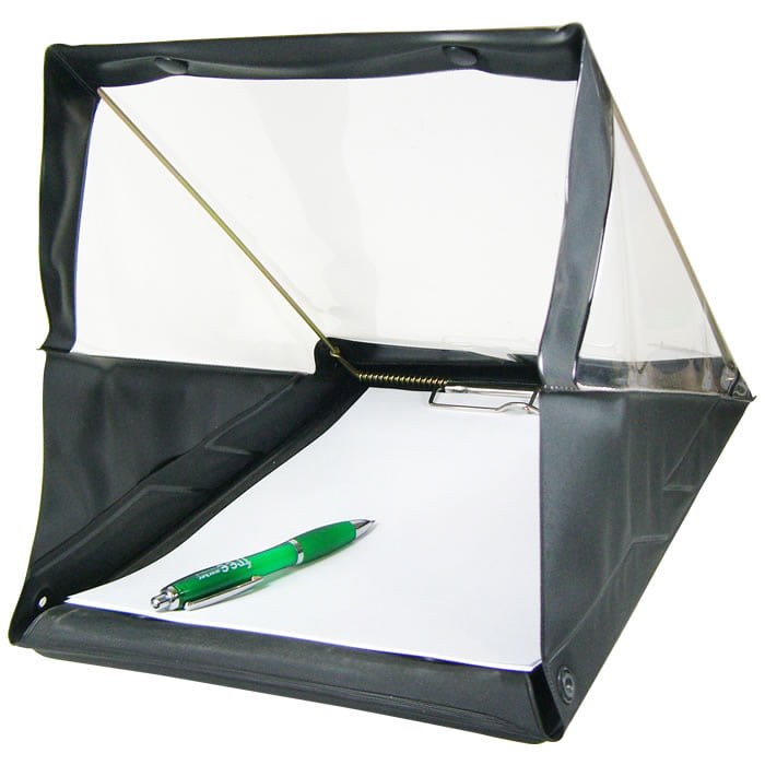 Weather Writer A4, a black writing pad with a transparent canopy on which a green pen and a white sheet of paper lie