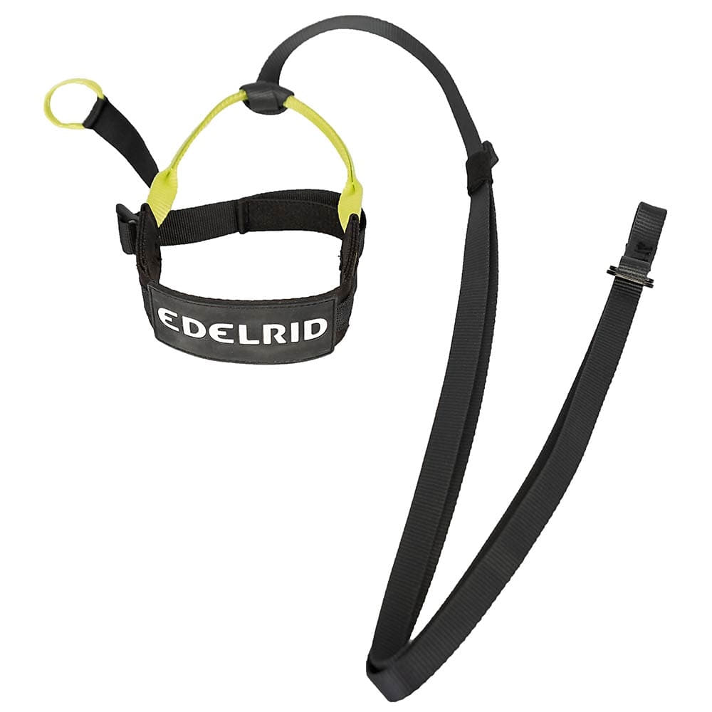 Prostep II by Edelrid, a black and yellow via ferrata set with harness and loops, lying with visible Edelrid logo