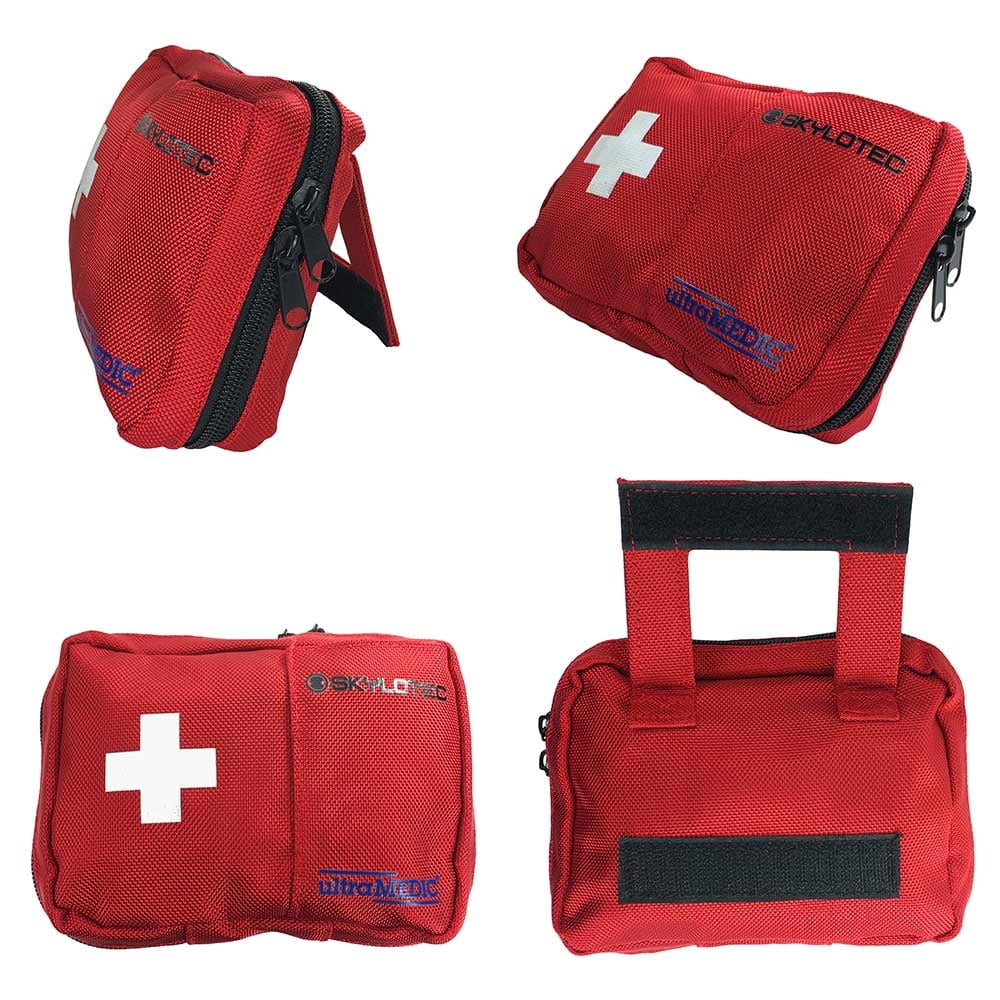 First aid bag from Skylotec in four views: side view with zipper, front view with white cross and logos, back view with two red loops and Velcro fastener, and oblique view with zipper, all in red made of robust fabric