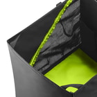 Close-up of the inside of the black and green bag with mesh fabric and green accents