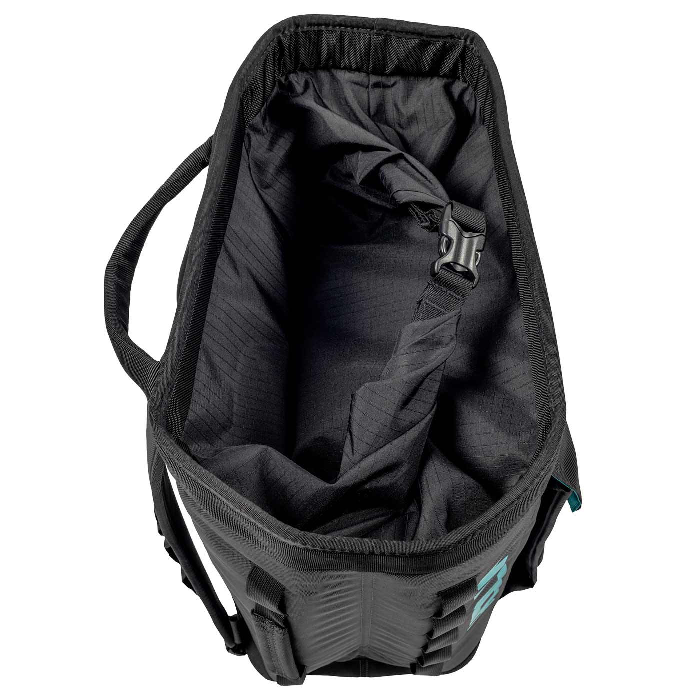 View from above into the black Approach Bag with open interior and adjustable strap with buckle