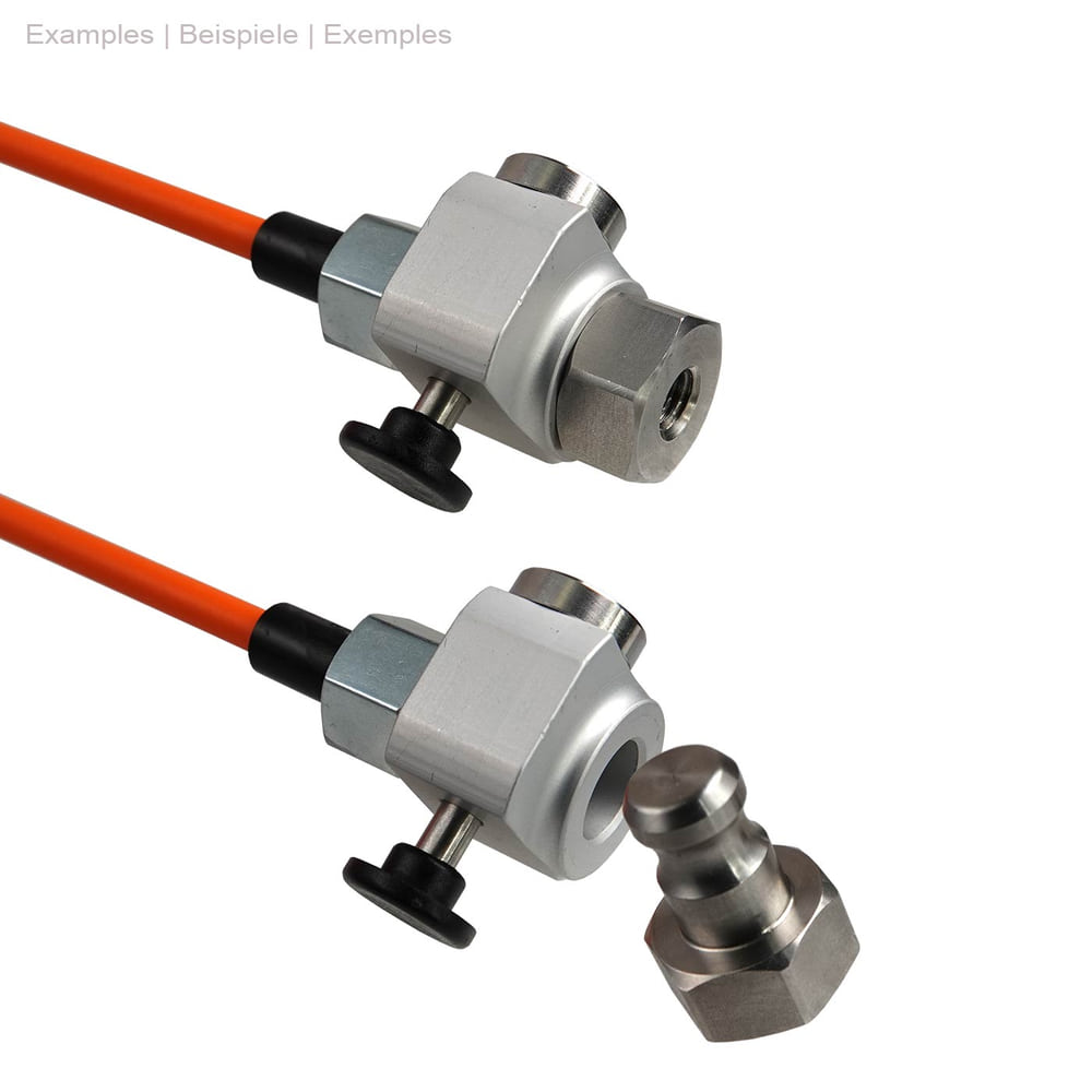 Kolibri Vario, close-up of two metal connectors with black knob and orange cable, one connector is removed