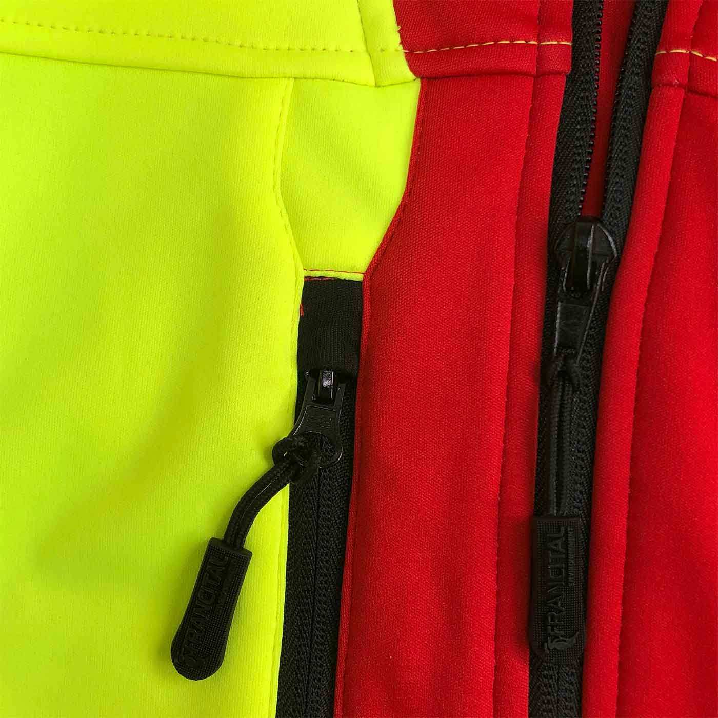 Aigoual R jacket close-up of black zippers and red and yellow fabric
