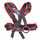upMOTION SRT, black and red padded climbing harness with multiple buckles and a rope ring in the middle