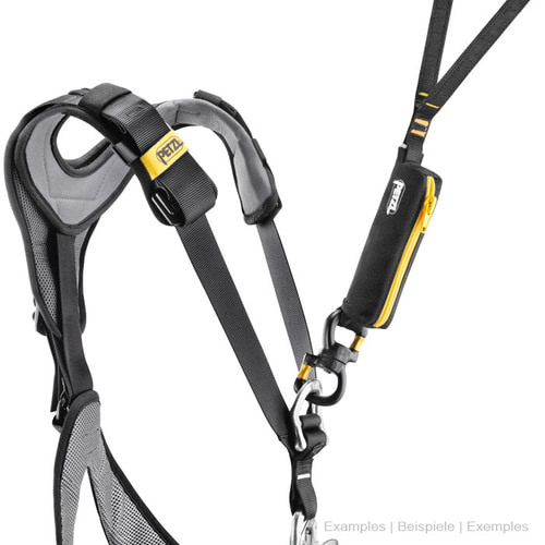 Climbing harness by Petzl in black with yellow details and various straps