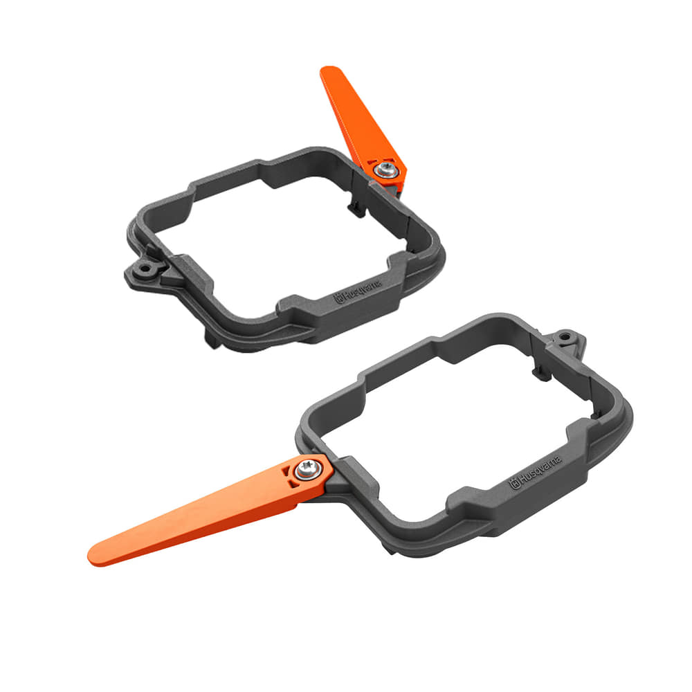 Wheel cleaning set, two grey rectangular brackets, each with an orange lever, manufacturer Husqvarna