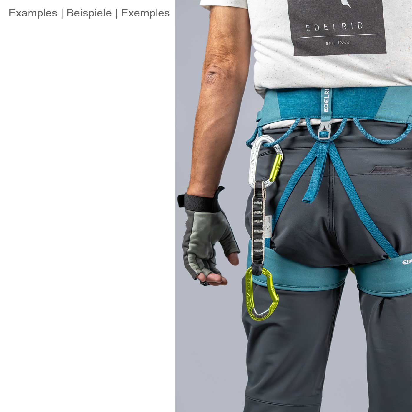 Person wearing Edelrid's Jay IV harness in blue and gray with two green carabiners on his left hip