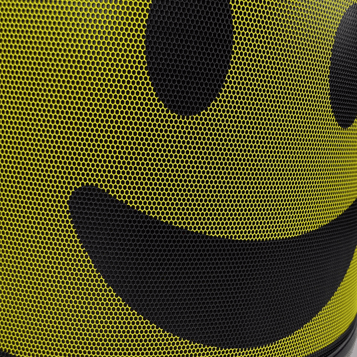 Close-up of PROTOS® visor Arbormoji with yellow background and black smiling face made of mesh material