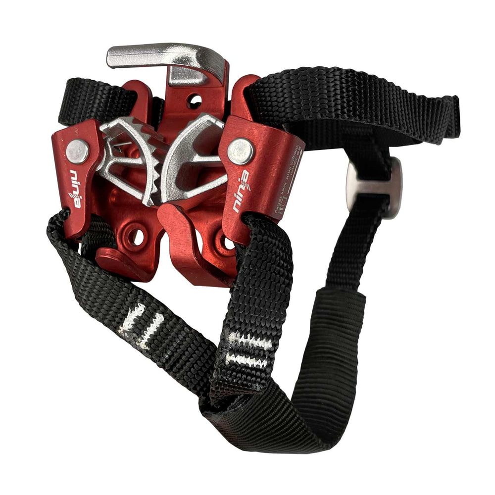 Ninja foot ascender in red with black straps and silver metal spikes, manufacturer name Ninja visible